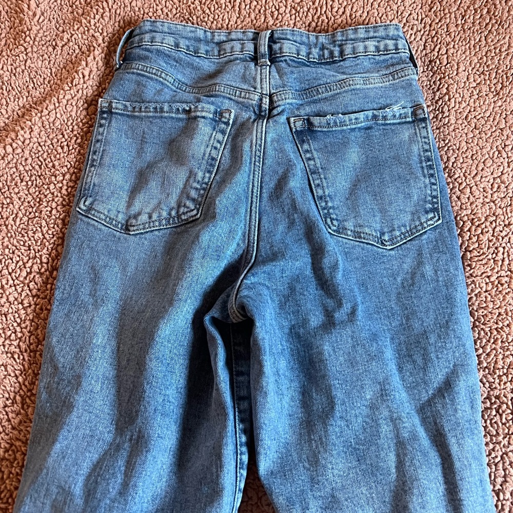 Old navy blue jeans with no holes